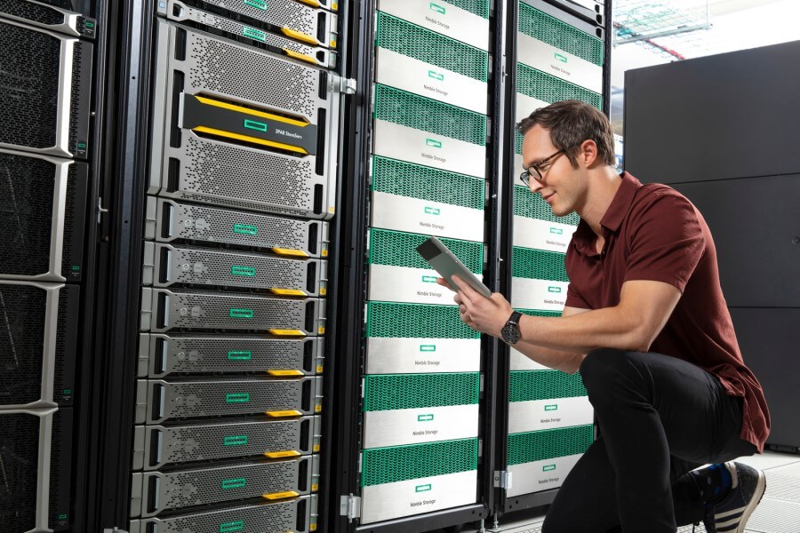 Man with tablet in server room