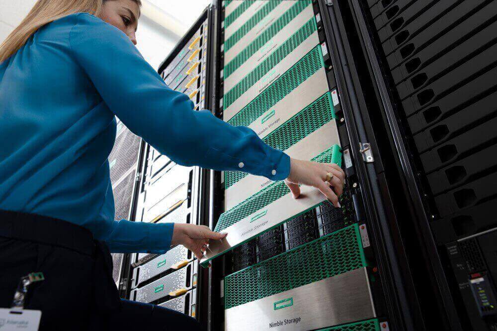 Close-up of woman working on a server rack